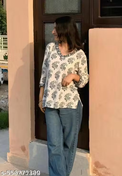 Pure Cotton Flower Printed V-Neck Designer Short Kurti For Women And Girls Best Comfy White Short Kurta With Blue Flower Print All Over The Kurti And Blue Flower Printed Lace Border Attached on Neckline And Sleeve Available In XXS To XL