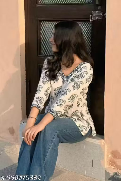 Pure Cotton Flower Printed V-Neck Designer Short Kurti For Women And Girls Best Comfy White Short Kurta With Blue Flower Print All Over The Kurti And Blue Flower Printed Lace Border Attached on Neckline And Sleeve Available In XXS To XL